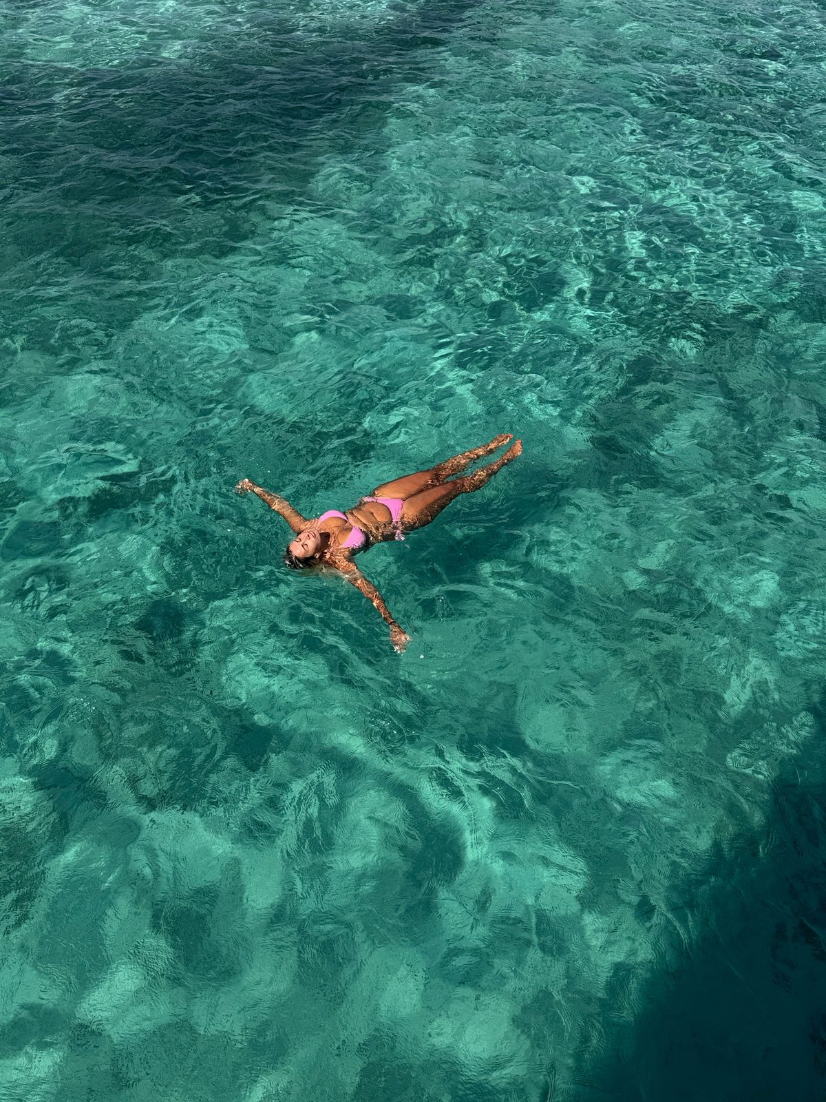 Floating in cool, crystal-clear water